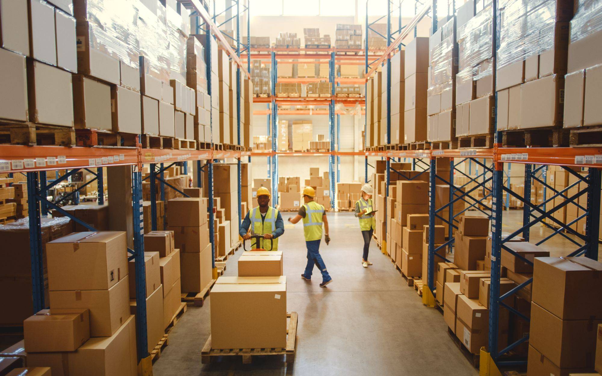 Retail Warehouse Full Of Shelves With Goods